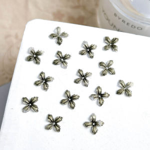 ชุดตกแต่งเล็บเรซิ่นกึ่งโปร่งแสงลายดอกไม้ 50 ชิ้น ลายดอกคามิลเลียสีดำทอง 5 กลีบ สำหรับตกแต่งเล็บ DIY