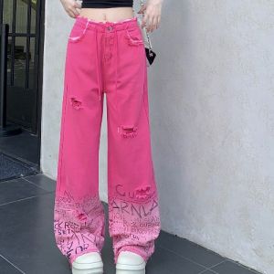 กางเกงยีนส์ทรงหลวมขาตรงสไตล์อเมริกันสำหรับผู้หญิง กางเกงขายาวทรงหลวมเอวสูง ทรงหลวม ฤดูร้อน 2024 กางเกงยีนส์ขาดลายการ์ตูน