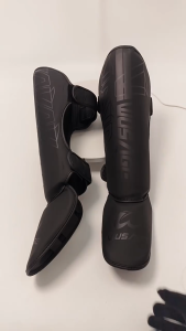 Pelindung Tulang Kering Muay Thai Shin Guard MMA Pelindung Kaki Dengan Perlindungan Punggung Kaki