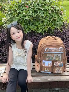 YA ZHOU LONG  กระเป๋านักเรียนทรงเด็กประถม Clow Mกระเป๋านักเรียนเกรด1-6การป้องกันกระดูกสันหลังลายการ์ตูนสำหรับเด็กผู้หญิงอายุ6-12ปีดีไซน์กระเป๋าเป้สะพายหลังเด็กกันน้ำน้ำหนักเบา