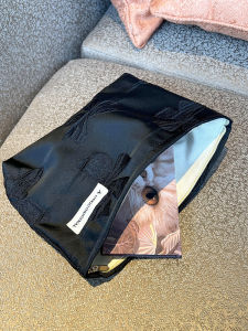 Original Black Bows Cosmetic Bag: A Minimalist & Elegant Travel Companion