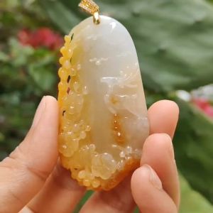 Very Rare Orange Yellow Natural Type A Jadeite Jade crafted with Deer added with 18k Gold Clasp as Pendant certificate weighs 33.26 grams measurement 64.8 * 35.2 * 8.5 mm (18kp48)