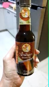 👍ง่วนสูน ตรามือที่ 1 น้ำมันงา Sesame oil 150 ml. เพียงเหยาะน้ำมันงาลงอาหารจานโปรดของคุณในขณะปรุง มีรสชาติอร่อย กลิ่นหอม  สินค้าพร้อมส่ง