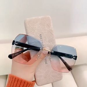 Kacamata Hitam Tanpa Bingkai untuk Wanita Perlindungan UV Bingkai Tidak Beraturan