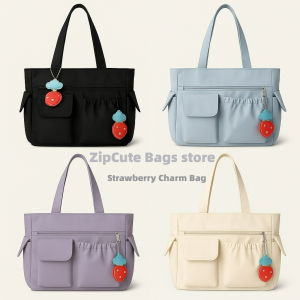 2025 new solid color simple versatile bag strawberry pendant cute hand bag college students commuting shoulder bag large capacit