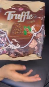 TRUFFLE BAG 500G HAZELNUT MILKY CHOCOLATE WITH CRISPED RICE FILING AND HAZELNUT CREAM