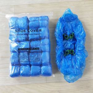เครื่องคลุมรองเท้ารูปตัว T อัตโนมัติใช้ในบ้านในร่มฟิล์มรองเท้าอัจฉริยะอุปกรณ์คลุมเท้ารูปตัว T แบบใช้แล้วทิ้งวัสดุ Pe