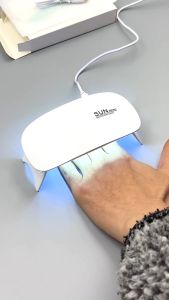 (GROSIR di chat) UV LED Nail Dryer Mesin Pengering Kutek Gel Mini UV LED Nail art dryer NL025
