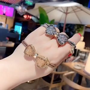 Cột tóc họa tiết nơ đính đá màu lấp lánh