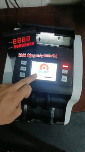 (MẪU MỚI) Máy đếm tiền GLORY đa chức năngphát hiện tiền giả tiền lẫn loạitổng số tiền theo từng mệnh giá khi đếm tiền lộn xộn