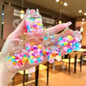 Chuỗi Khóa Dung Dịch Cát Chảy Phát Sáng trong Đêm