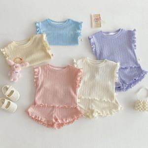 2025 ฤดูร้อนทารกแรกเกิดเด็กทารกสีทึบชุด Ruffled เสื้อแขนกุดและกางเกงขาสั้นเกาหลีแฟชั่นนุ่มสบายชุดเด็ก