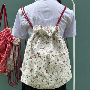 กระเป๋าเป้สะพายหลังลายดอกไม้💐