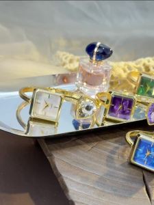 Đồng Hồ Đeo Tay Nữ Dạng Vòng Tay Mở Đính Kim Cương Đá Quý Nhiều Màu Sắc Hình Dạng Đa Dạng Máy Quartz Cao Cấp Sang Trọng Thời Trang Thích Hợp Đeo Hàng Ngày