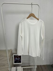 เสื้อยืดคอกลมแขนยาวผ้าฝ้ายสีขาวสำหรับผู้หญิงในฤดูใบไม้ร่วงและฤดูหนาว เสื้อชั้นในหลวมๆ สบายๆ ลำลอง ทรงหลวมๆ ทรงหลวมๆ