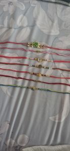 Sacred Rakhi Collection Rakhi Gift Set for Rakshabandhan 3pc 4pc 5pc with decorative beads and charms