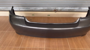 นชนหลัง TOYOTA SOLUNA VIOS ปี2003-2006 แท้ศูนย์ (G.1) (สีพื้นงานดิบ - ต้องนำไปทำสีเพิ่ม)