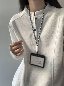 เสื้อยืดคอกลมแขนยาวสไตล์อเมริกันสำหรับผู้ชายในฤดูใบไม้ร่วง ทรงหลวม ลายตัดเย็บแบบต่อ ปกแขน ทรงหลวม