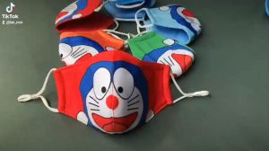 Khẩu trang vải Đôrêmon cho bé từ 4 đến 10 tuổi có dây rút điều chỉnh nhiều màu