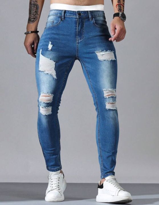 Tight men's frayed jeans