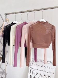 เสื้อโยคะแขนยาวเซ็กซี่สุดเก๋พร้อมแผ่นเสริมหน้าอกแบบถุงน่องแบบสวมหัวสำหรับผู้หญิง เสื้อออกกำลังกายฟิตเนส ฤดูใบไม้ผลิและฤดูร้อน