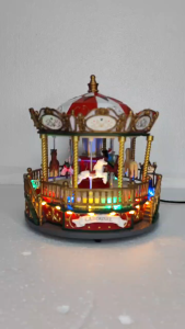 D&D Home l FC815 Fairground carousel Scene Christmas Village Ornament Multi Light Sound
