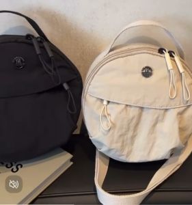 Less more lasting soft nylon stylish round shape handle carry sling bag with 3 compartments