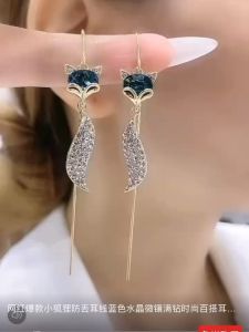 แสดงใบหน้าผอมแฟชั่นคริสตัลสุนัขจิ้งจอกประเภทหูสายพู่ยาวต่างหูแฟชั่นสุทธิสีแดงร้อยต่างหูสำหรับผู้หญิง