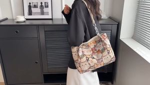 Cute canvas tote bag with cat and rabbit designs large-capacity shoulder bag for spring and summer.
