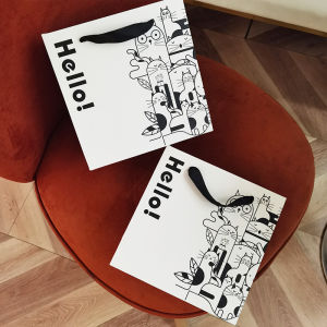 Black And White Birthday Gift Bag Cartoon Design Handheld Paper Bag Premium Feel Beautiful Souvenir Handbag Customizable