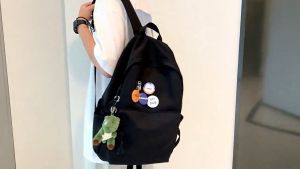 Casual Canvas Backpack with Embellished Accents and Charm