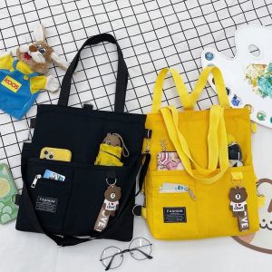 กระเป๋าผ้าใบ Tote Bag กระเป๋าสะพายไหล่ข้างเดียวสำหรับผู้หญิง กระเป๋าถือสำหรับนักเรียนที่ต้องการเพิ่มความรู้ในช่วงฤดูร้อน กระเป๋าผ้าใบที่ทนทานและมีสไตล์