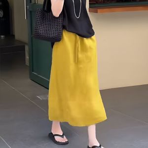 กระโปรงยาวผ้าลินินสีเหลืองทรงเอเอวสูง กระโปรงยาวผ่าข้าง ทรงหลวม กระโปรงสั้นสไตล์เกาหลี ฤดูร้อน 2024 กระโปรงยาวคลุมเข่า