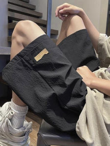 กางเกงขาสั้นกีฬาทรงหลวมสไตล์อเมริกันสำหรับผู้ชาย กางเกงขายาวห้าส่วนสำหรับเยาวชน ทรงหลวม ฤดูร้อน 2025 แบรนด์ใหม่