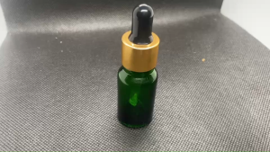 ขวด 10 มล. ( 6 ใบ) แก้วกลม สีเขียว+ฝาสีทอง+บีบดำ+หลอดแก้ว 09#18