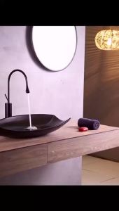 Chậu rửa mặt lavabo nghệ thuật đặt bàn LV011 BẢO HÀNH MEN SỨ 20 NĂM - Kiểu thuyền - Màu đen - Vòi gắn ngoài chậu lavabo mang phong cách trẻ trung - Chính hãng Audi