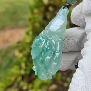 Very Beautiful Finger Citron Natural Type A Jadeite pendant jewelry  with NGI Gemstone report weight 76.79 grams 52.83 * 24.26 * 9.38 mm - Highly Translucent very fine grain with patches of light green suffused to a paler ground (pendant151)