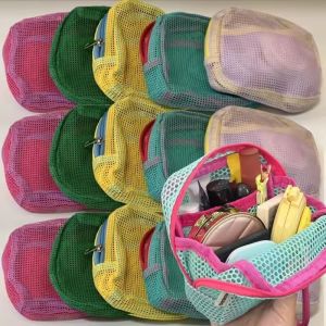 กระเป๋าซิปใส่เครื่องสำอางขนาดเล็กกระเป๋าเก็บผ้าอนามัยชุดหูฟังแบบพกพาสำหรับผู้หญิงกระเป๋าใส่เครื่องสำอางค์ลายตาข่ายหลากสี