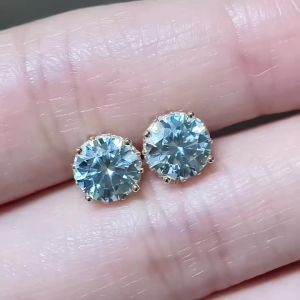 A Pair of 925 Silver Stud Earrings for Women Featuring 1-Carat Moissanite Stones—Suitable for Daily Wear.