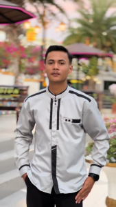 Kemeja koko ELRUMI Terbaru motif katulistiwa lengan panjang