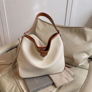 กระเป๋าถือทรงถุงใหญ่สำหรับผู้หญิง กระเป๋าสะพายข้างแบบสะพายไหล่ข้างเดียวสำหรับการเดินทางไปทำงานในช่วงฤดูร้อนปี 2025 กระเป๋าถือแบบลำลอง