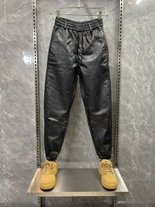 กางเกงหนังบุขนแกะหนาสำหรับผู้ชาย กางเกงขายาวทรงหลวม กางเกงขายาวสไตล์ฮาราจูกุ กันลม กันน้ำ ฤดูใบไม้ร่วง/ฤดูหนาว กางเกงขายาวลำลอง