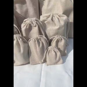 (แพ็ค10ใบ) (2ขนาดใหญ่แบ่ง แพ็ค5ใบ) พร้อมส่ง ถุงผ้าดิบไม่ฟอก ถุงผ้าดิบ ถุงผ้าหูรูด ถุงผ้าใส่เครื่องประดับ ถุงดิบ ถุงผ้าฝ้าย ถุงผ้าเปล้า ถุงผ้า