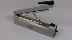 Máy hàn miệng túi 30cm x 8mm Ruixiang PFS-300 khung vỏ nhôm không kén túi