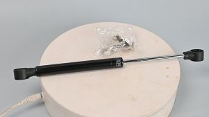 Ty chống thủy lực hỗ trợ nâng cánh cửa tủ gỗ