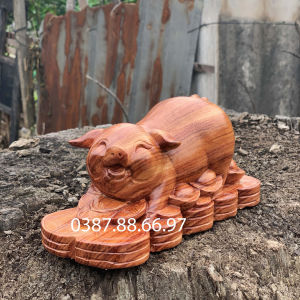 Tượng con heo linh vật tuổi hợi dài 15 20cm chất liệu gỗ hương cực đẹp