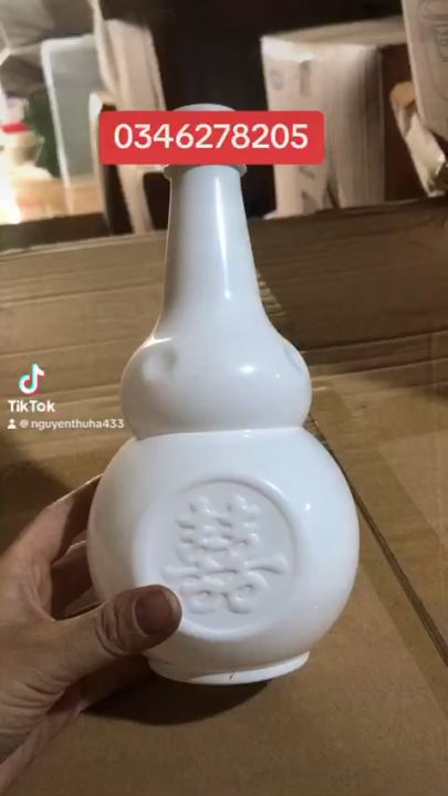 Chai nhựa hồ lô nhựa song long màu trắng sứ 800ml đựng nước, đựng riệu tiện lợi