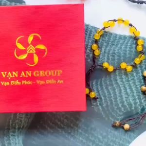 Vòng tay đá mã não vàng bện dây Vạn An Group trang sức phong thủy mang đến may mắn bình an tài lộc