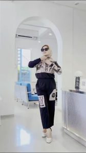 Oneset nuddi setelan wanita