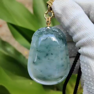 Double Dragon Floating Green Flower clouds 18k gold Natural Type A Jadeite pendant  with NGI Gemstone report carved as wu shi pai weight 34.82 grams  53.06 * 38.86 * 9.37 mm  Translucent Very Fine Grain with patches of bluish green (18kp3)